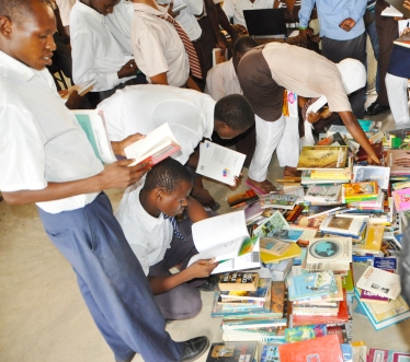 Students from Buyani High School experiencing a llibrary for the first time in their lives. Thank you one and all for your books. You've helped open up their world !